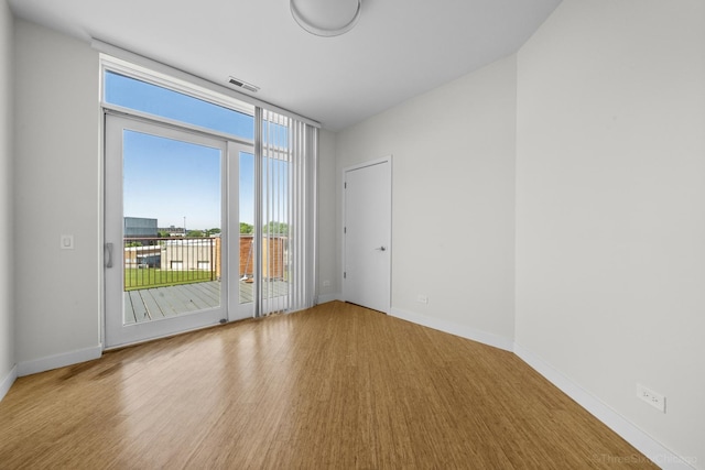 1322 N Clybourn Ave Unit 4S, Chicago, IL 60610 - unfurnished room with baseboards and wood finished floors