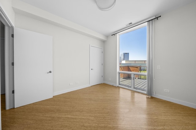 1322 N Clybourn Ave Unit 4S, Chicago, IL 60610 - unfurnished room featuring wood finished floors and baseboards