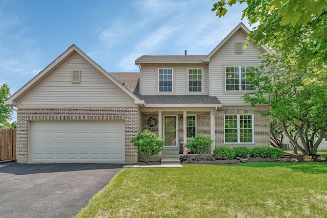 633 Salem Cir, Oswego, IL 60543 - traditional-style house with brick siding, asphalt driveway, an attached garage, and a shingled roof