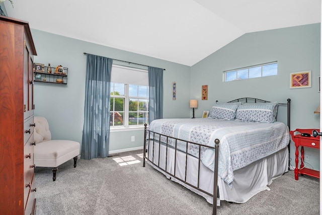 633 Salem Cir, Oswego, IL 60543 - bedroom featuring multiple windows, carpet, vaulted ceiling, and baseboards