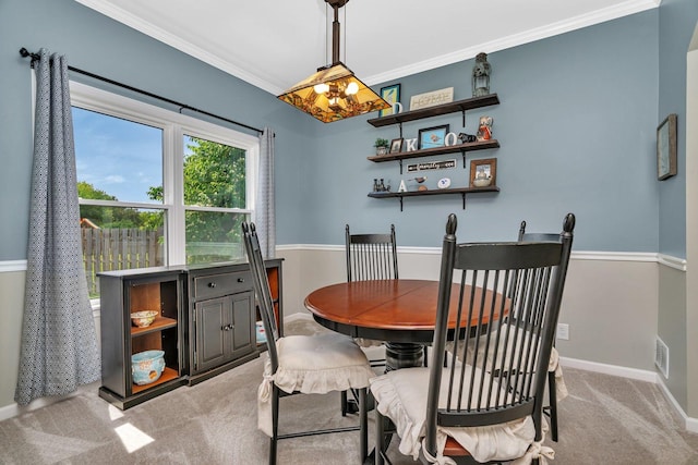 633 Salem Cir, Oswego, IL 60543 - carpeted dining room featuring ornamental molding and baseboards