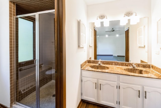 26 Marina Dr, Des Plaines, IL 60016 - bathroom featuring double vanity, a stall shower, and a ceiling fan