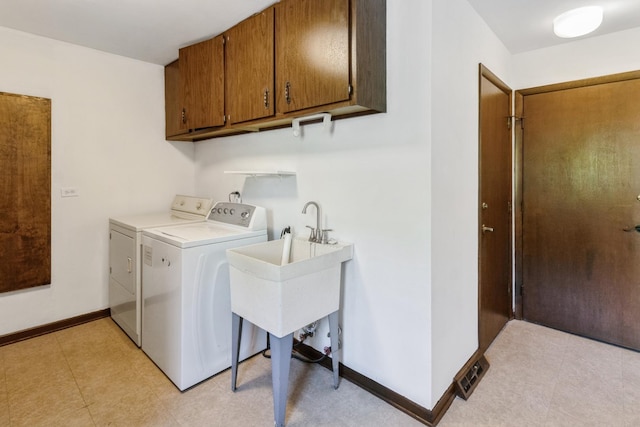 26 Marina Dr, Des Plaines, IL 60016 - laundry room featuring cabinet space, washing machine and clothes dryer, and baseboards