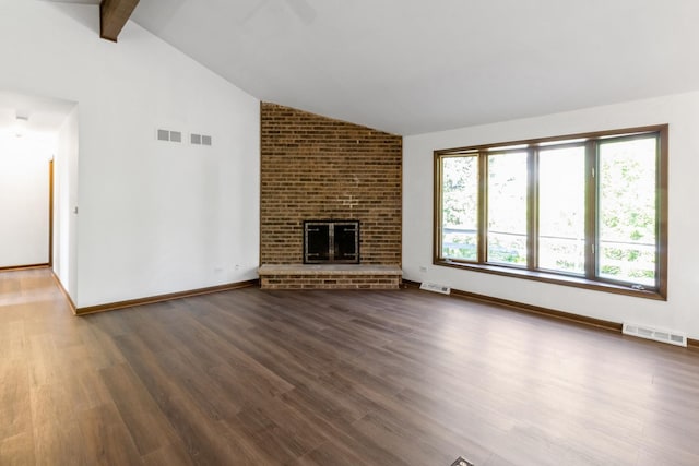 26 Marina Dr, Des Plaines, IL 60016 - unfurnished living room featuring wood finished floors, a fireplace, beam ceiling, baseboards, and high vaulted ceiling