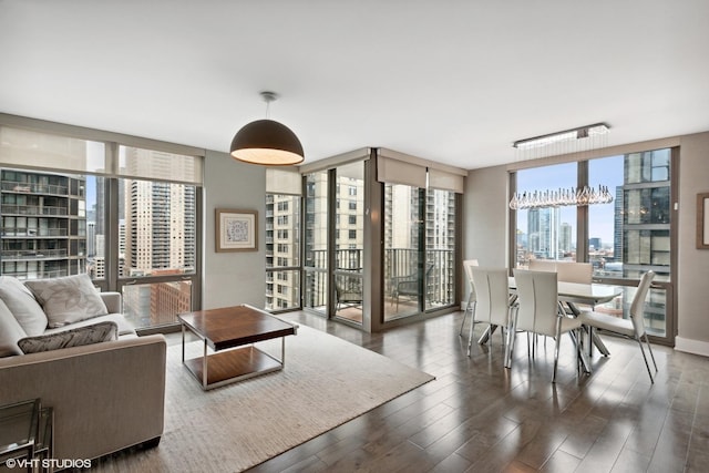 2 E Erie St Unit 1605, Chicago, IL 60611 - living area featuring expansive windows, wood finished floors, and a view of city