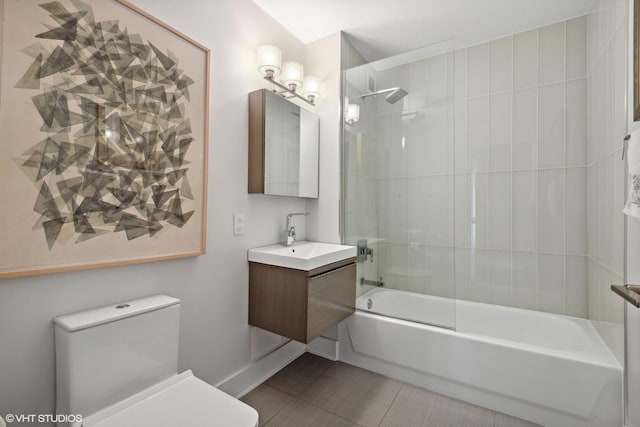 2 E Erie St Unit 1605, Chicago, IL 60611 - full bathroom featuring vanity, toilet, shower / washtub combination, and tile patterned floors