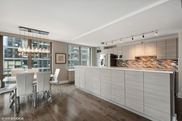 2 E Erie St Unit 1605, Chicago, IL 60611 - dining area featuring dark wood-style floors and baseboards