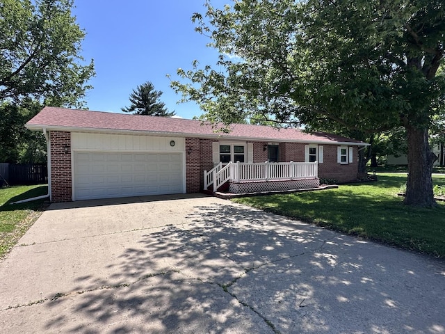 600 E 7th St, Rock Falls, IL 61071 - ranch-style home with brick siding, concrete driveway, and an attached garage