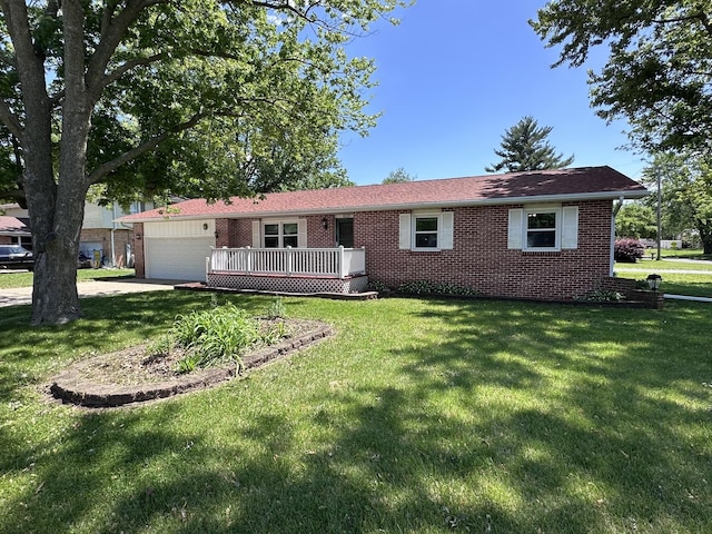 600 E 7th St, Rock Falls, IL 61071 - ranch-style home with brick siding, a garage, and a front lawn