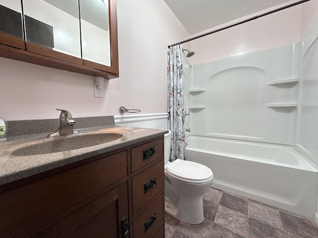 600 E 7th St, Rock Falls, IL 61071 - full bath with vanity, shower / bath combo, toilet, and stone finish floors