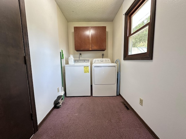 600 E 7th St, Rock Falls, IL 61071 - washroom with washing machine and dryer, a textured ceiling, carpet floors, cabinet space, and baseboards