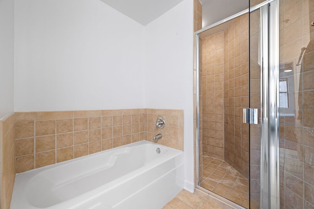 1529 S State St Unit 13G, Chicago, IL 60605 - bathroom with a garden tub, a stall shower, and tile patterned flooring