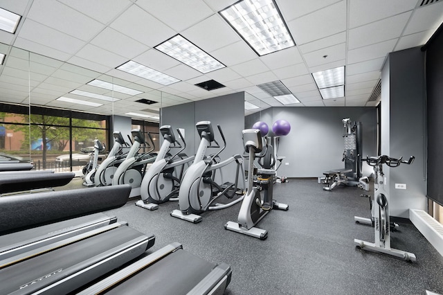 1529 S State St Unit 13G, Chicago, IL 60605 - exercise room featuring a paneled ceiling and baseboards