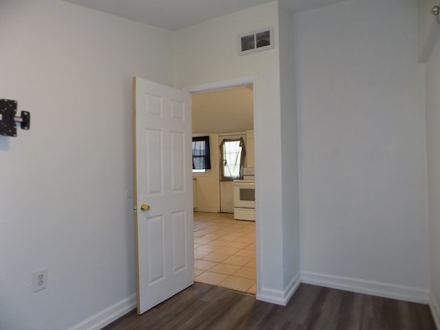 7818 Mildred Rd, Machesney Park, IL 61115 - spare room with baseboards and dark wood-style flooring