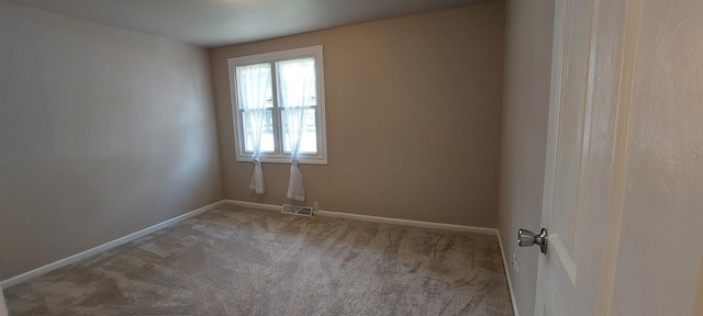 8923 S Main St, Hometown, IL 60456 - spare room featuring carpet and baseboards