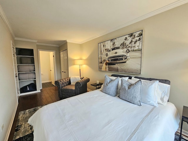 1730 Hinman Ave Unit 4F, Evanston, IL 60201 - bedroom featuring baseboards, wood finished floors, and ornamental molding
