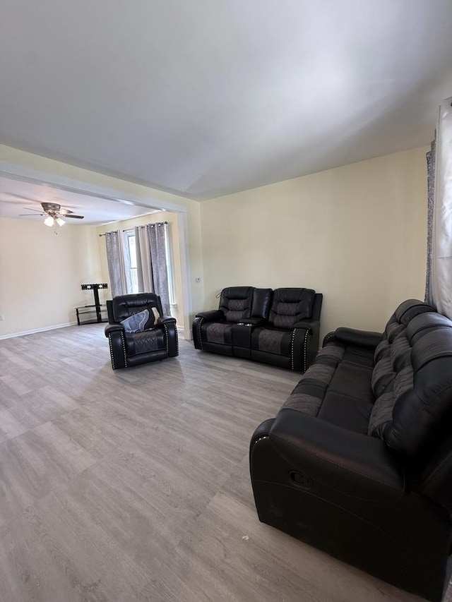 1435 S 57th Ave, Cicero, IL 60804 - living area featuring baseboards, wood finished floors, and a ceiling fan