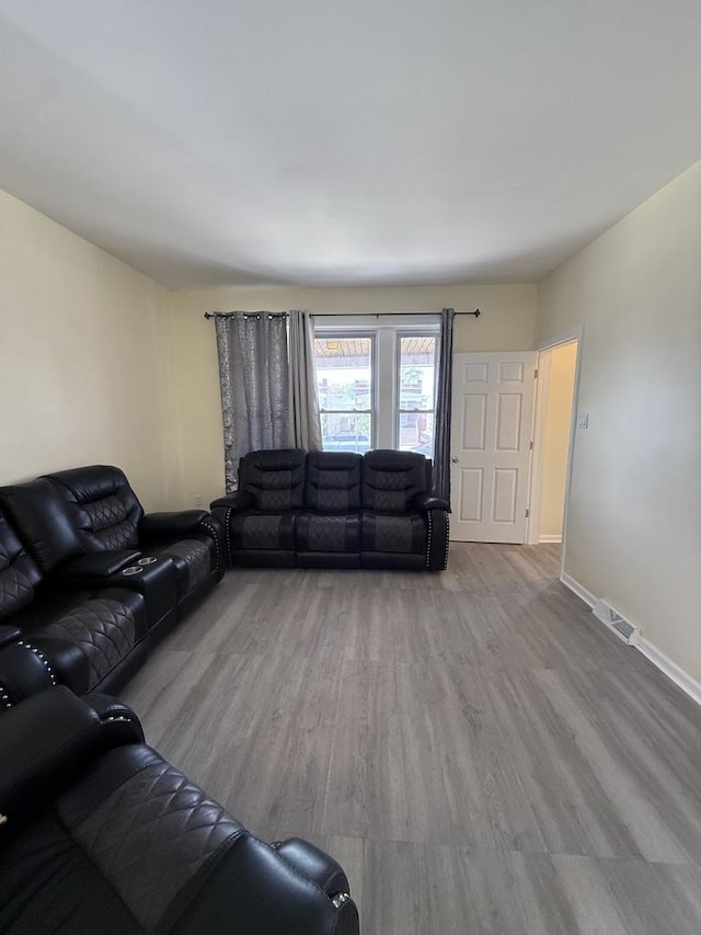 1435 S 57th Ave, Cicero, IL 60804 - living room featuring wood finished floors and baseboards