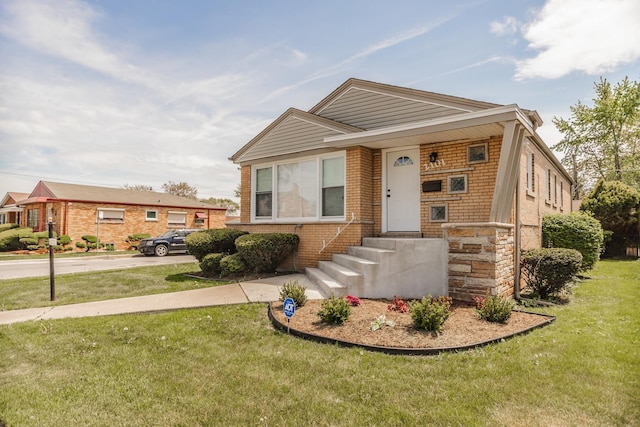 2101 W 82nd Pl, Chicago, IL 60620 - view of front of home featuring a front lawn and brick siding