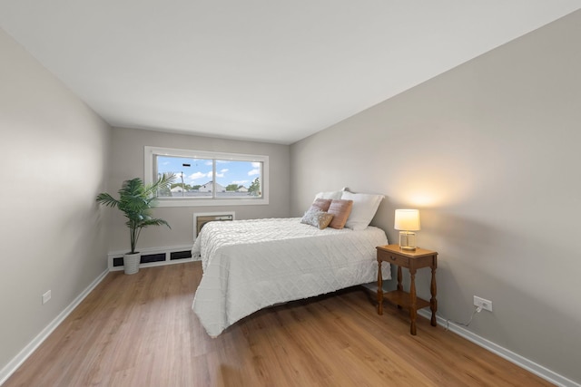 1320B Lore Ln Unit 117, Lombard, IL 60148 - bedroom featuring light wood-style flooring and baseboards