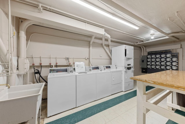 1320B Lore Ln Unit 117, Lombard, IL 60148 - communal laundry room featuring washer and dryer and stacked washer and clothes dryer