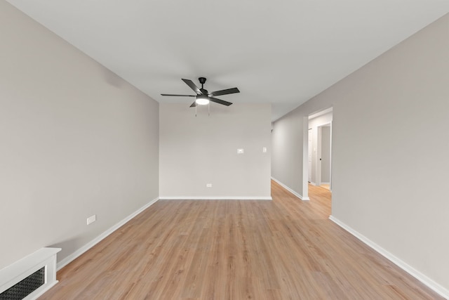 1320B Lore Ln Unit 117, Lombard, IL 60148 - empty room with a ceiling fan, light wood finished floors, and baseboards