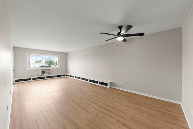 1320B Lore Ln Unit 117, Lombard, IL 60148 - spare room with wood finished floors, a ceiling fan, and baseboards