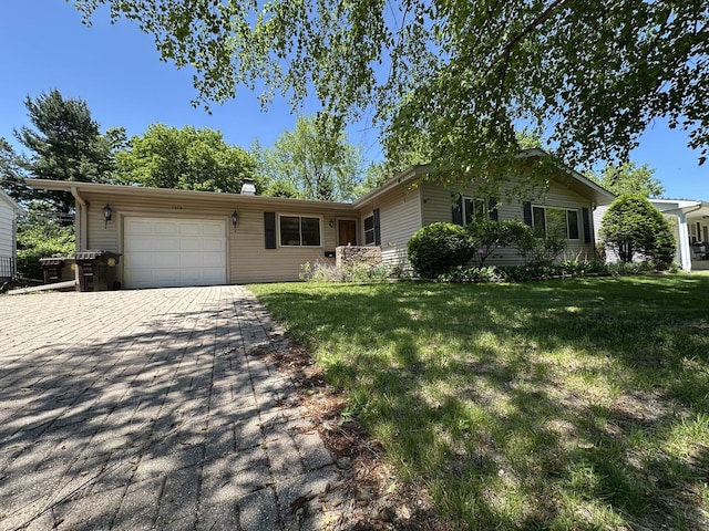 1322 Empire Ct, Freeport, IL 61032 - ranch-style home featuring an attached garage, driveway, a front yard, and a chimney