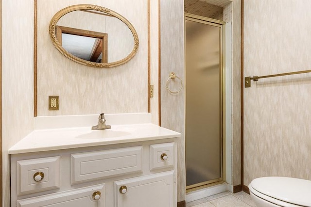 1322 Empire Ct, Freeport, IL 61032 - full bathroom with a stall shower, vanity, toilet, tile patterned flooring, and wallpapered walls