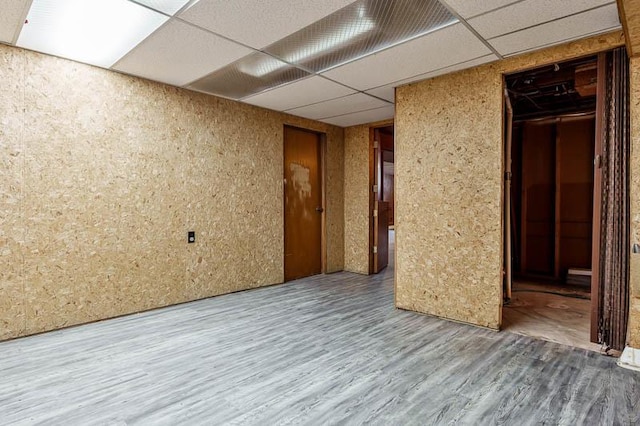 1322 Empire Ct, Freeport, IL 61032 - spare room featuring a drop ceiling and wood finished floors