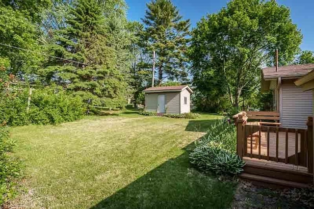1322 Empire Ct, Freeport, IL 61032 - view of grassy yard with a deck