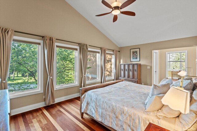 15629 W 139th St, Homer Glen, IL 60491 - bedroom featuring wood finished floors, baseboards, high vaulted ceiling, and a ceiling fan