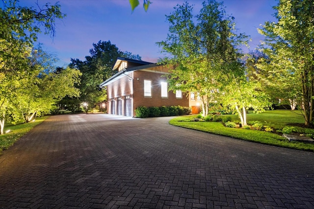 15629 W 139th St, Homer Glen, IL 60491 - view of property exterior with decorative driveway, brick siding, and an attached garage