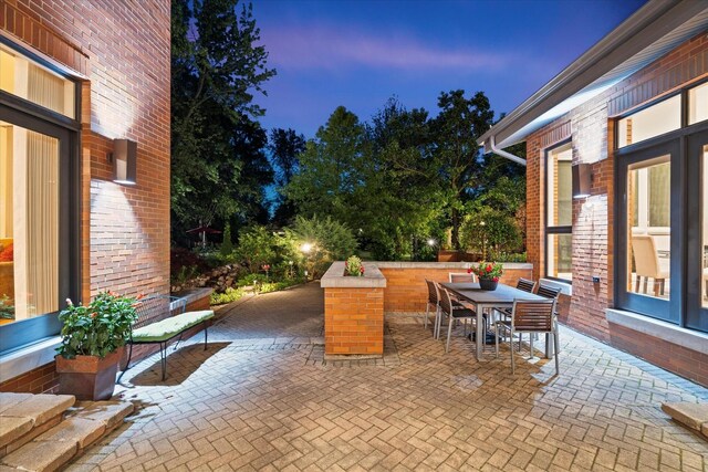 15629 W 139th St, Homer Glen, IL 60491 - patio terrace at dusk featuring a patio area and outdoor dining area