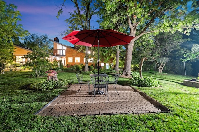 15629 W 139th St, Homer Glen, IL 60491 - yard at dusk featuring a patio area and a yard