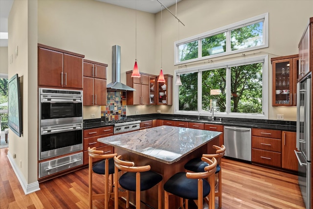 15629 W 139th St, Homer Glen, IL 60491 - kitchen with exhaust hood, appliances with stainless steel finishes, a high ceiling, a warming drawer, and a sink