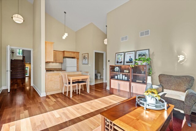 15629 W 139th St, Homer Glen, IL 60491 - living room with high vaulted ceiling, baseboards, and wood finished floors