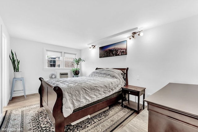 8758 W Berwyn Ave Unit 2N, Chicago, IL 60656 - bedroom featuring light wood-style floors and baseboards