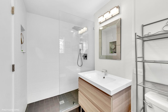 8758 W Berwyn Ave Unit 2N, Chicago, IL 60656 - full bathroom with vanity, toilet, and a walk in shower
