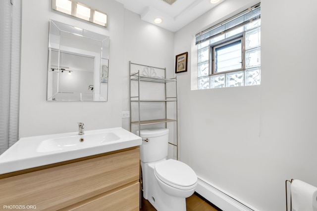 8758 W Berwyn Ave Unit 2N, Chicago, IL 60656 - bathroom with toilet, a baseboard radiator, and vanity