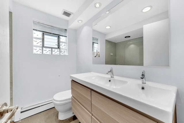8758 W Berwyn Ave Unit 2N, Chicago, IL 60656 - full bath featuring baseboard heating, toilet, vanity, a shower, and recessed lighting