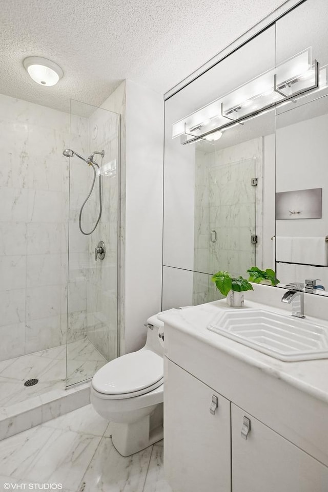 195 N Harbor Dr Unit 801-809, Chicago, IL 60601 - bathroom with vanity, a marble finish shower, a textured ceiling, and marble look tiles