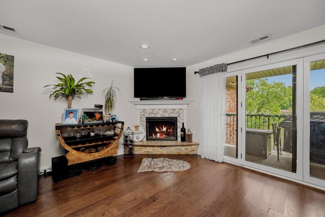 8771 Waterfront Dr Unit 3A, Palos Hills, IL 60465 - living area with wood finished floors, a stone fireplace, and recessed lighting