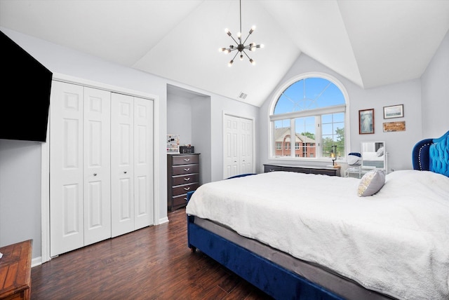 8771 Waterfront Dr Unit 3A, Palos Hills, IL 60465 - bedroom featuring two closets, dark wood finished floors, a chandelier, and high vaulted ceiling