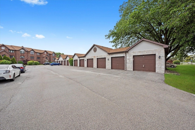 8771 Waterfront Dr Unit 3A, Palos Hills, IL 60465 - view of asphalt street featuring community garages and a residential view