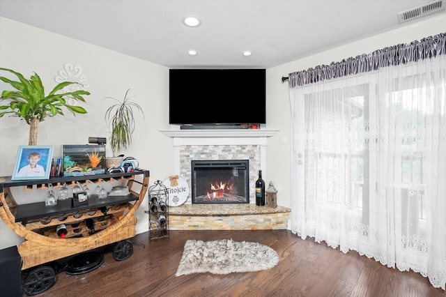 8771 Waterfront Dr Unit 3A, Palos Hills, IL 60465 - living area featuring recessed lighting, a stone fireplace, and wood finished floors