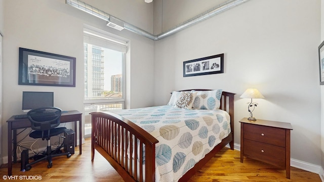 2025 S Indiana Ave Unit 503, Chicago, IL 60616 - bedroom with wood finished floors and baseboards
