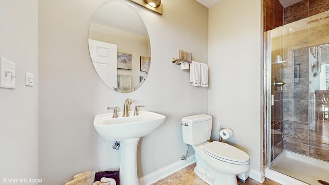 2025 S Indiana Ave Unit 503, Chicago, IL 60616 - bathroom featuring toilet, baseboards, a stall shower, and tile patterned flooring