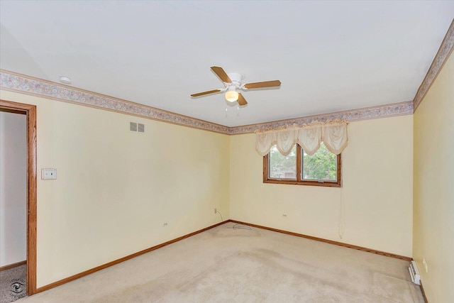 16560 Currant Ave, Tinley Park, IL 60487 - spare room featuring light colored carpet, baseboards, and a ceiling fan