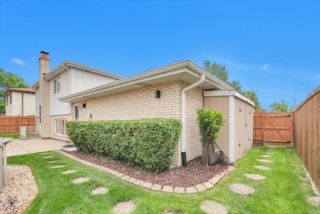 16560 Currant Ave, Tinley Park, IL 60487 - view of side of property with brick siding, a chimney, and a patio
